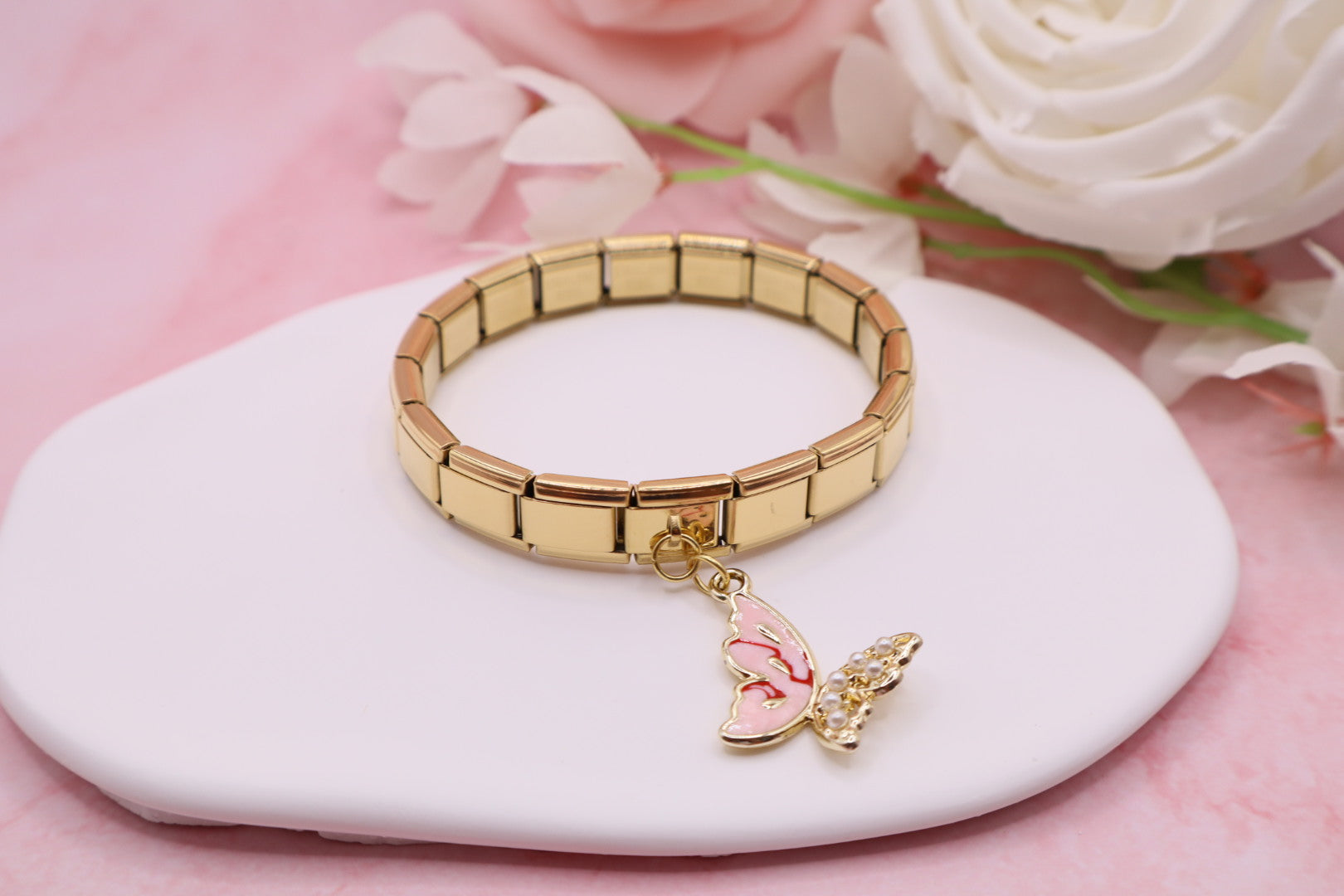 Pulseras de eslabones italianos en acero inoxidable con diferentes dijes.