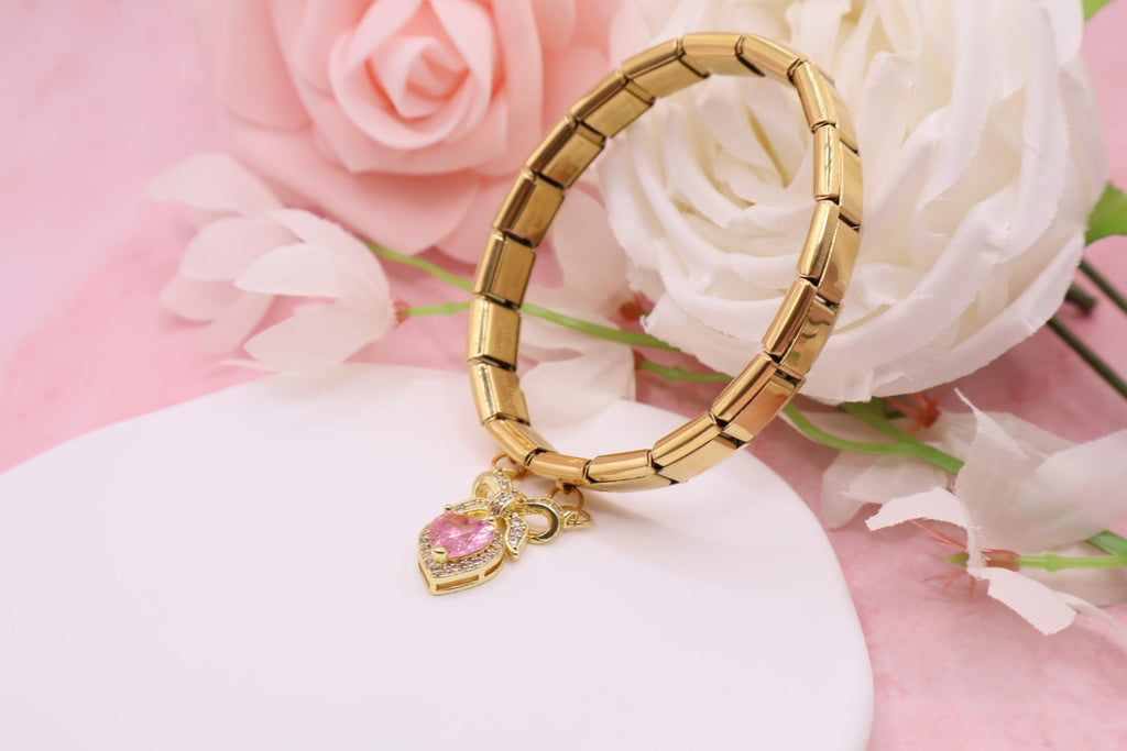 Pulseras de eslabones italianos en acero inoxidable con diferentes dijes.