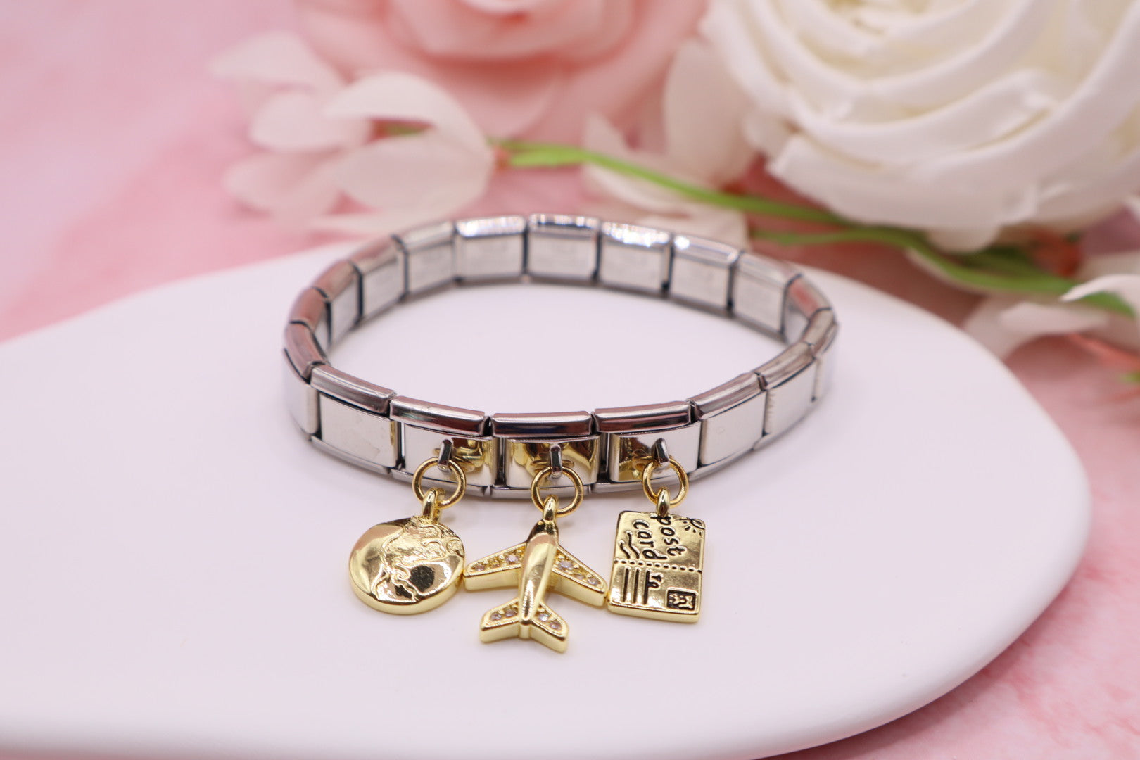 Pulseras de eslabones italianos en acero inoxidable con diferentes dijes.