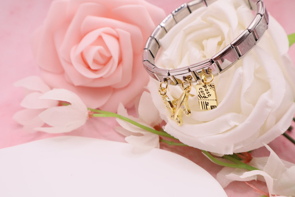 Pulseras de eslabones italianos en acero inoxidable con diferentes dijes.