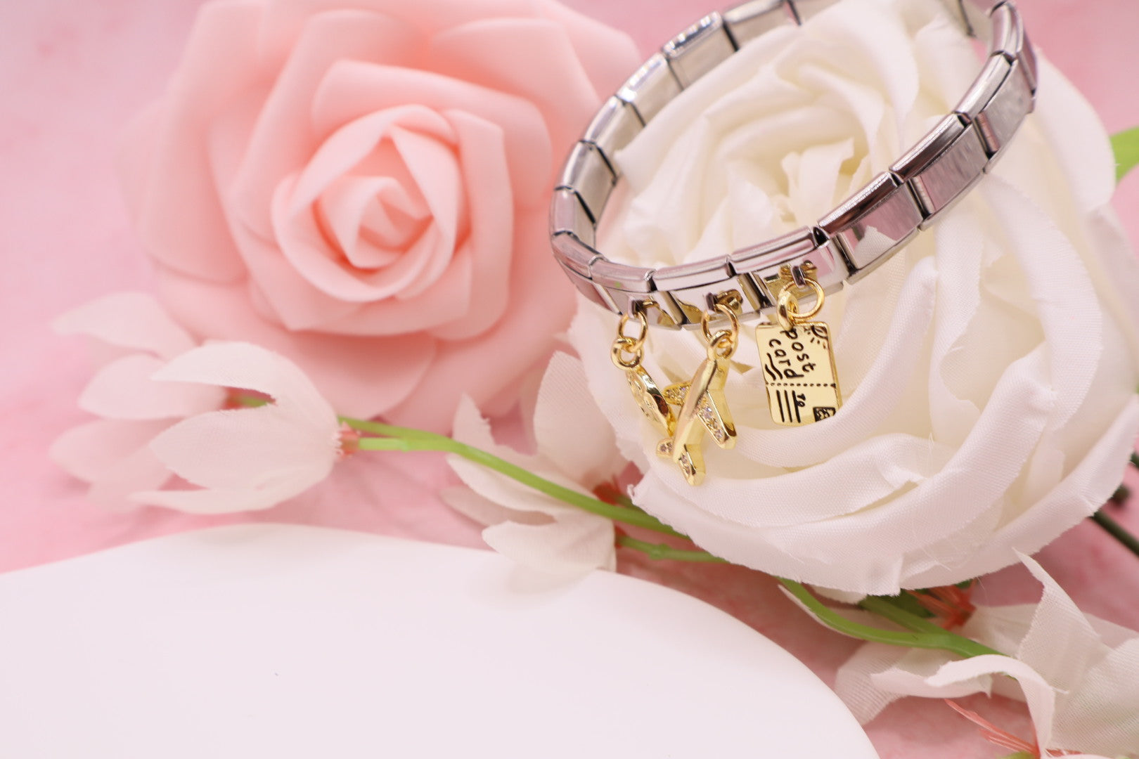 Pulseras de eslabones italianos en acero inoxidable con diferentes dijes.