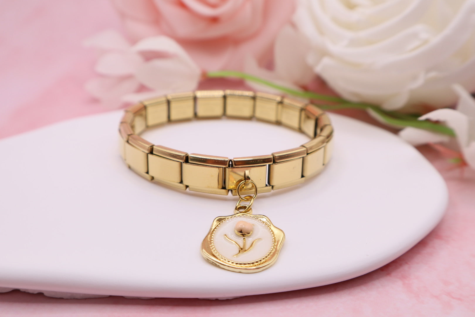 Pulseras de eslabones italianos en acero inoxidable con diferentes dijes.