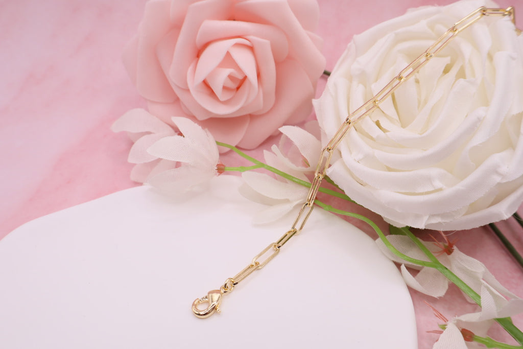 Pulsera de eslabones estilo clic bañada en oro 18k