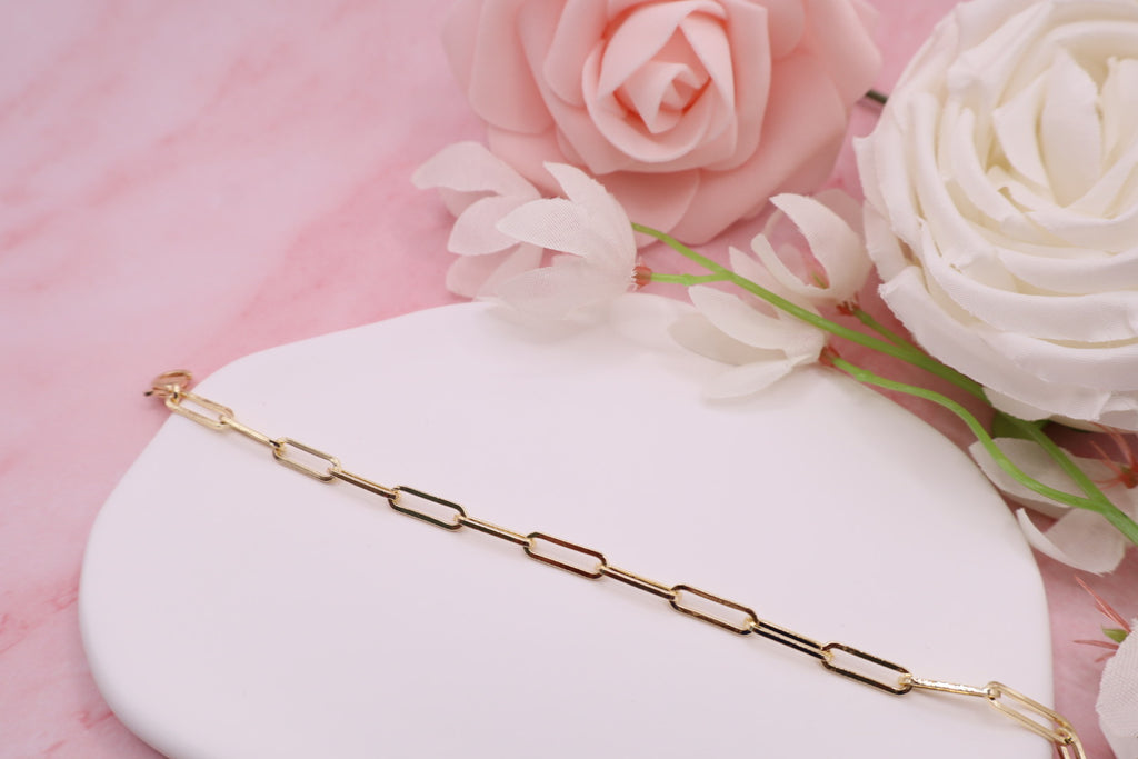 Pulsera de eslabones estilo clic bañada en oro 18k