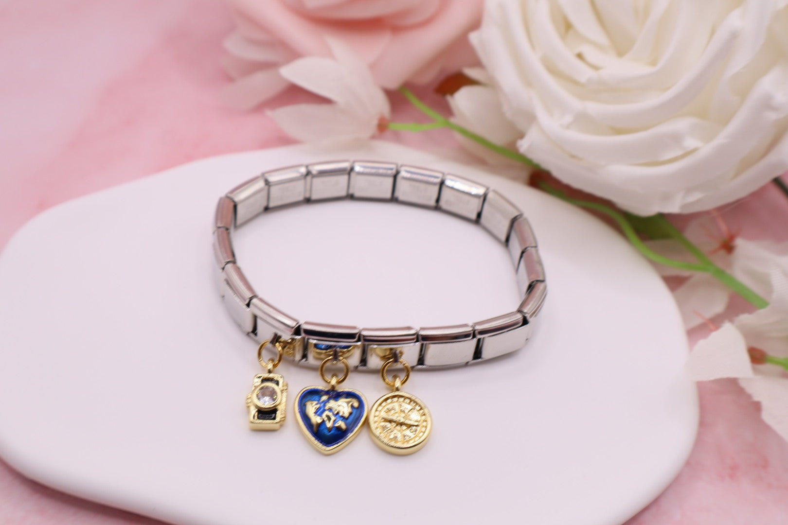 Pulseras de eslabones italianos en acero inoxidable con diferentes dijes.