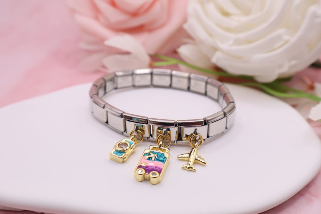 Pulseras de eslabones italianos en acero inoxidable con diferentes dijes.