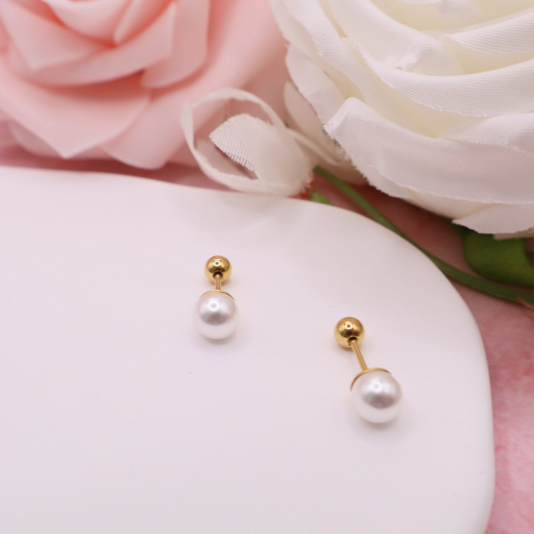 Pendientes con cierre de rosca (broqueles) en acero inoxidable.